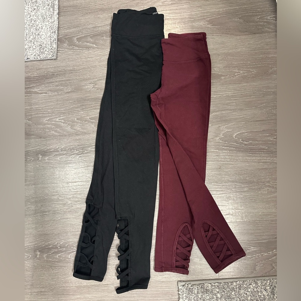 Bundle of two criss crossed leggings. Maroon and Black